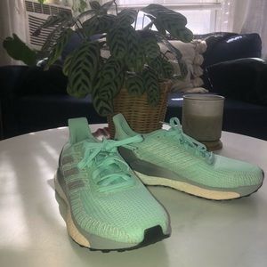 New mint green adidas running shoes/sneakers